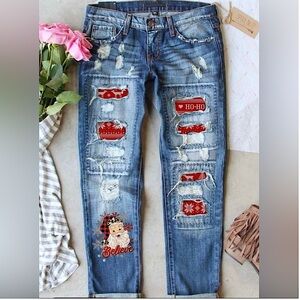 Distressed Blue Boyfriend Jeans with Festive Patches
